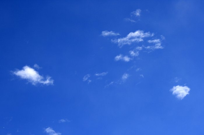 bright-blue-sky-with-a-few-tiny-white-clouds-picture-free-photograph-4wqh0E-clipart